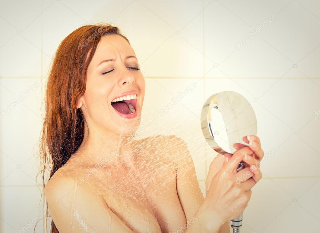 Young woman singing in the shower