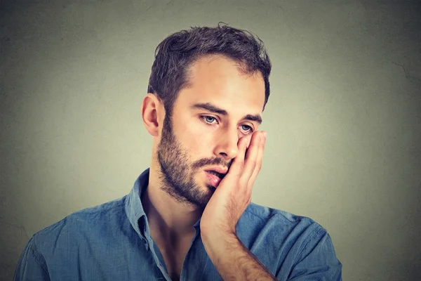 Portrait of desperate unhappy man isolated on gray wall background — Φωτογραφία Αρχείου