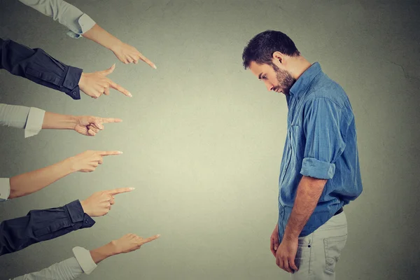 Accusation of guilty person man. man looking down fingers pointing at him — Stock Photo, Image
