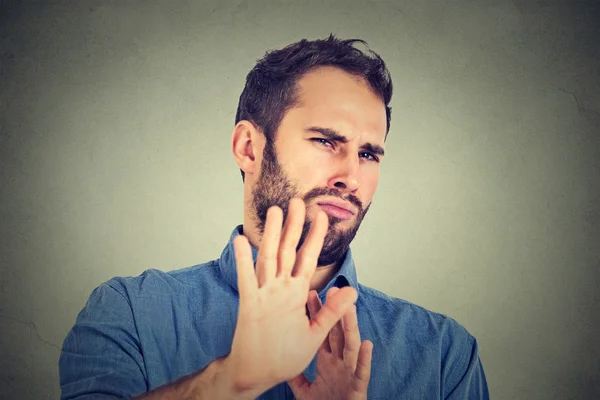 Disgusted young man — Stock Photo, Image