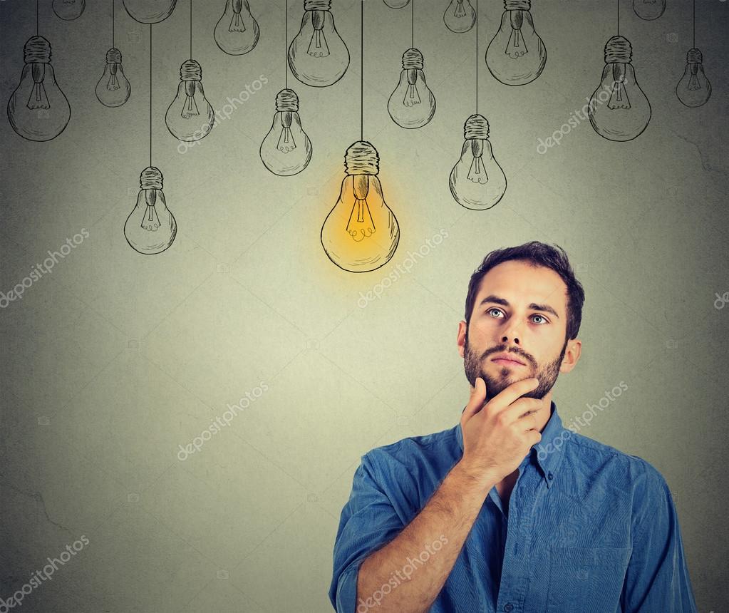 Bevise Forskelsbehandling patologisk Man looking up with idea light bulb above head Stock Photo by  ©SIphotography 86972838