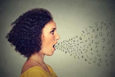 Woman talking with alphabet letters coming out of her mouth. Communication intelligence concept