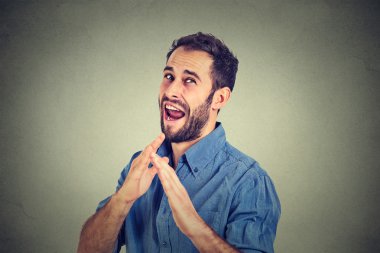 angry mad, furious man raising hands in the air attack with karate chop