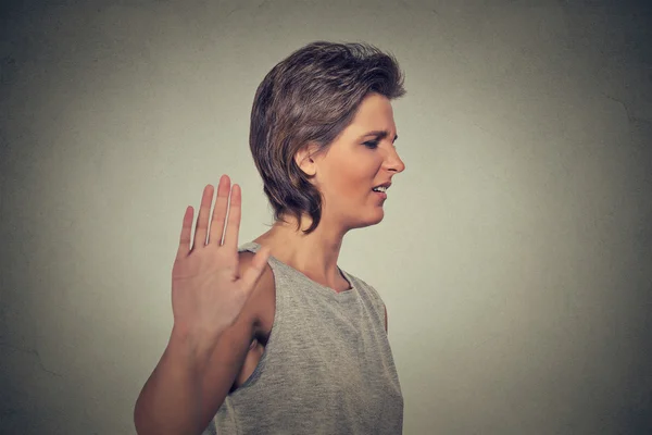 Annoyed angry woman with bad attitude giving talk to hand gesture — Stock Photo, Image