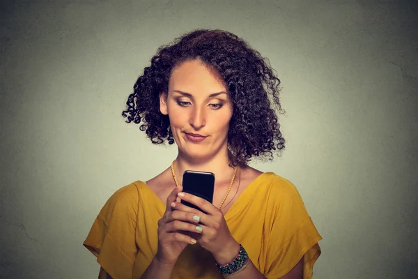 Upset skeptical unhappy serious woman talking texting on phone — Stok fotoğraf