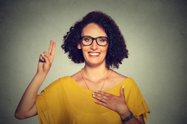 Young woman making a promise clipart
