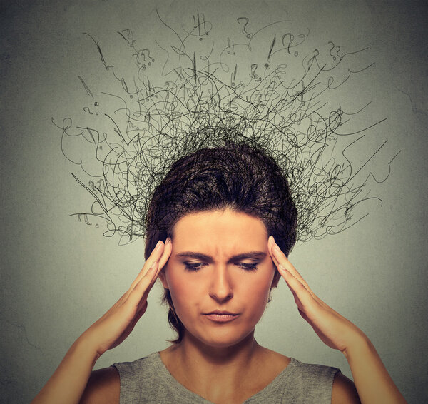 woman with worried stressed face expression frowning and brain melting into lines