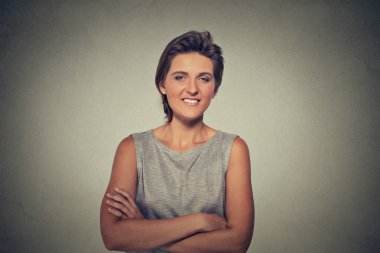 happy confident successful pretty young woman with arms crossed 