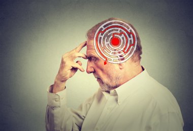 Side profile elderly man solving problem thinking