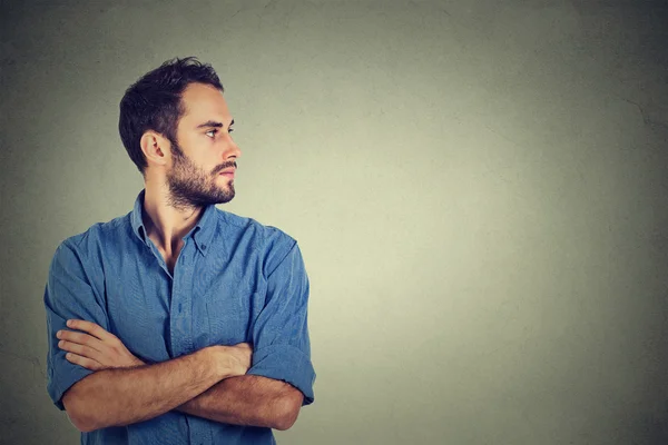Side profile young man looking at his side — Stock Photo, Image