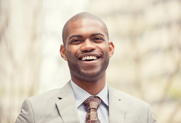 Headshot portrait of young professional man smiling laughing — Stock fotografie