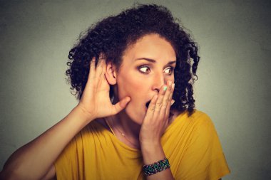 surprised nosy woman hand to ear gesture carefully intently secretly listening