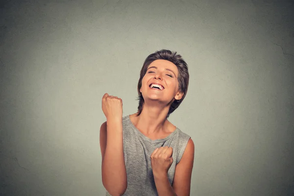 Success. Happy woman exults pumping fists ecstatic celebrates success — Stockfoto