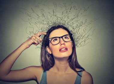 woman scratching head, thinking with brain melting into lines question marks