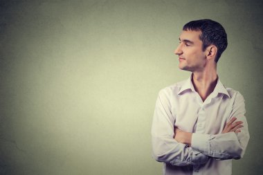 Side profile of handsome man on gray background
