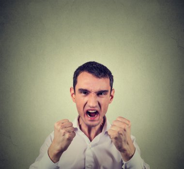 angry displeased young man screaming