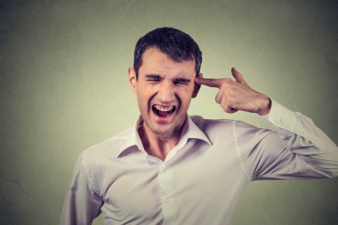 man committing suicide with finger gun gesture