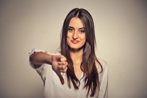 Woman with thumbs down gesture — Stock Photo, Image