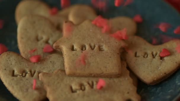 Red Scarlet Heart Shaped Sugar Confetti Crumbling Falling Cookie Love — Stock Video