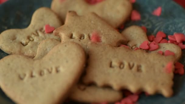 Red Scarlet Heart Shaped Sugar Confetti Crumbling Falling Cookie Love — Stock Video