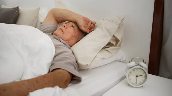 Asian Senior Man Has Insomnia Sleepless Bed Home Due Stress Stock Image