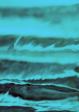 Denizi ve mavi, turkuaz ve gri dalgaları betimleyen geniş bir görüntü.