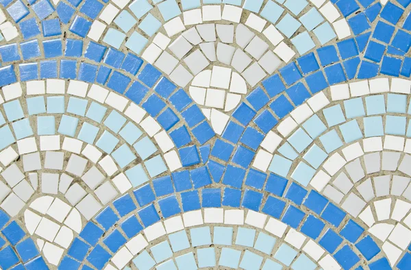 Blue and white square shaped tiles in circular pattern — Stock Photo, Image