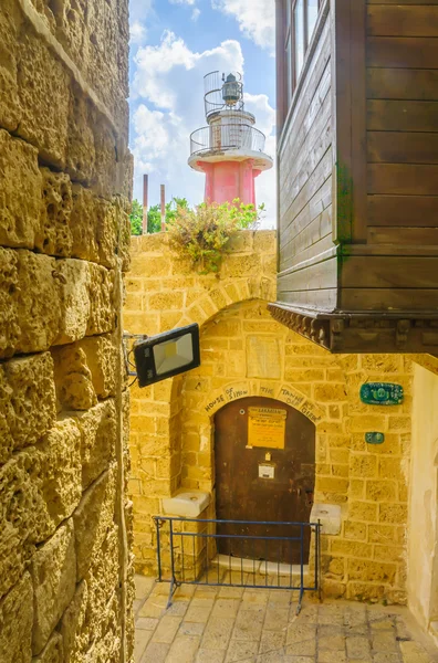 Alley and a lighthouse in the old city of Jaffa — Stock Photo, Image