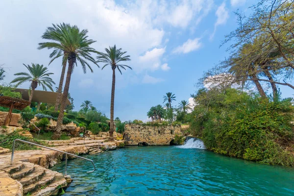 View of natural warm water pool and an old mill in Gan HaShlosha National Park (Sakhne), in the Bet Shean Valley, Northern Israel