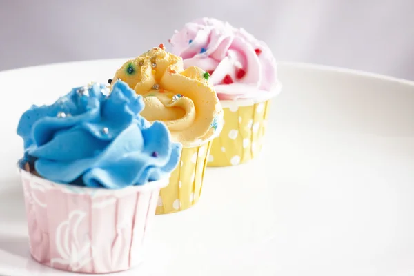 Cupcakes coloridos Imagens Royalty-Free