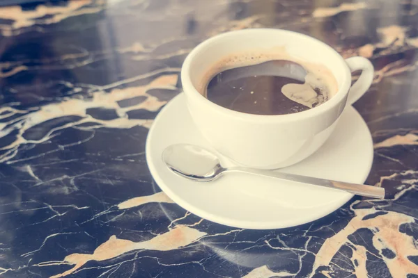 Black coffee on black mable — Stock Photo, Image