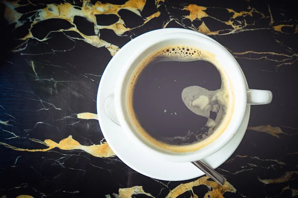 Black coffee on black mable — Stock Photo, Image