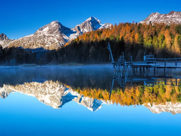 Reflections on lake Lej da Staz — Stock Photo, Image