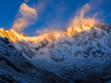 Annapurna South in Nepal at sunrise clipart
