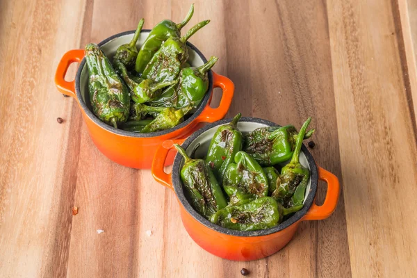 Roasted padron peppers in casserols — Stock Photo, Image