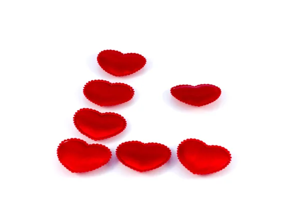 Letra L pequeña tela corazón rojo sobre un fondo blanco —  Fotos de Stock
