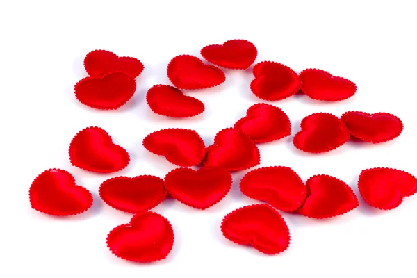 Several small red hearts tissue on a white background — Stock Photo, Image