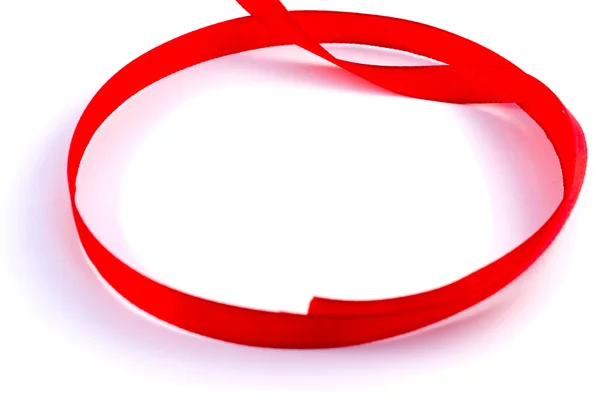 Beyaz bir arka plan üzerinde kırmızı bant döngü — Stok fotoğraf