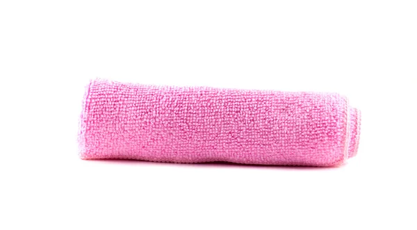 Pink towel rolled up on a white background — Stock Photo, Image