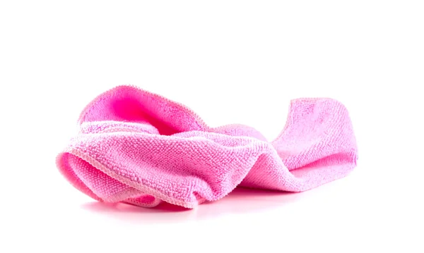 Розовое полотенце на белом фоне — стоковое фото