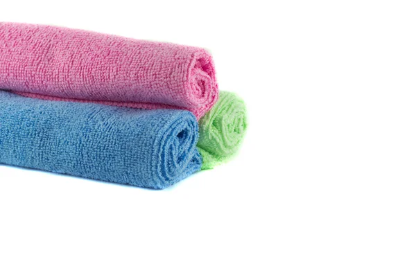 A roll of green, blue and pink towels — Stock Photo, Image