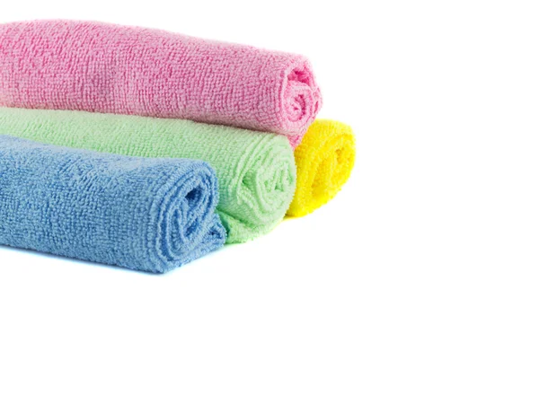 Roll of green, blue, pink and yellow towels — Stock Photo, Image