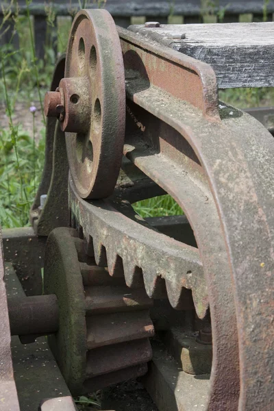 Старая сельскохозяйственная машина - деталь — стоковое фото