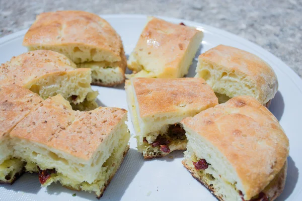 Seasoned bread, typical Sicilian dish.
