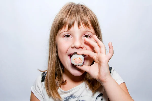 Girl and sushi — Stock Photo, Image