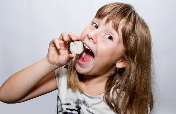 Girl and sushi — Stock Photo, Image