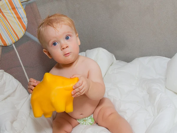 Baby with moneybox — Stock Photo, Image