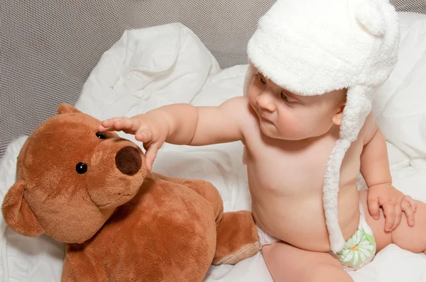 Baby boy in white bear hat — Stock Photo, Image