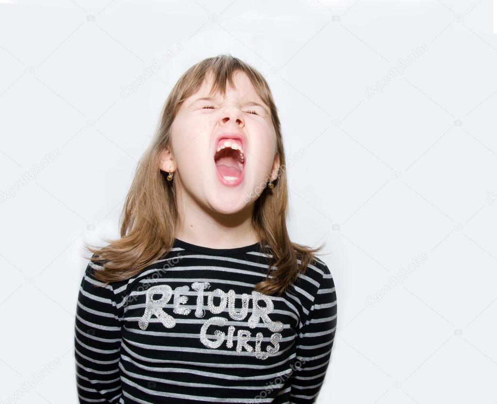 Teen girl yells Stock Photo by ©milanika 61329509