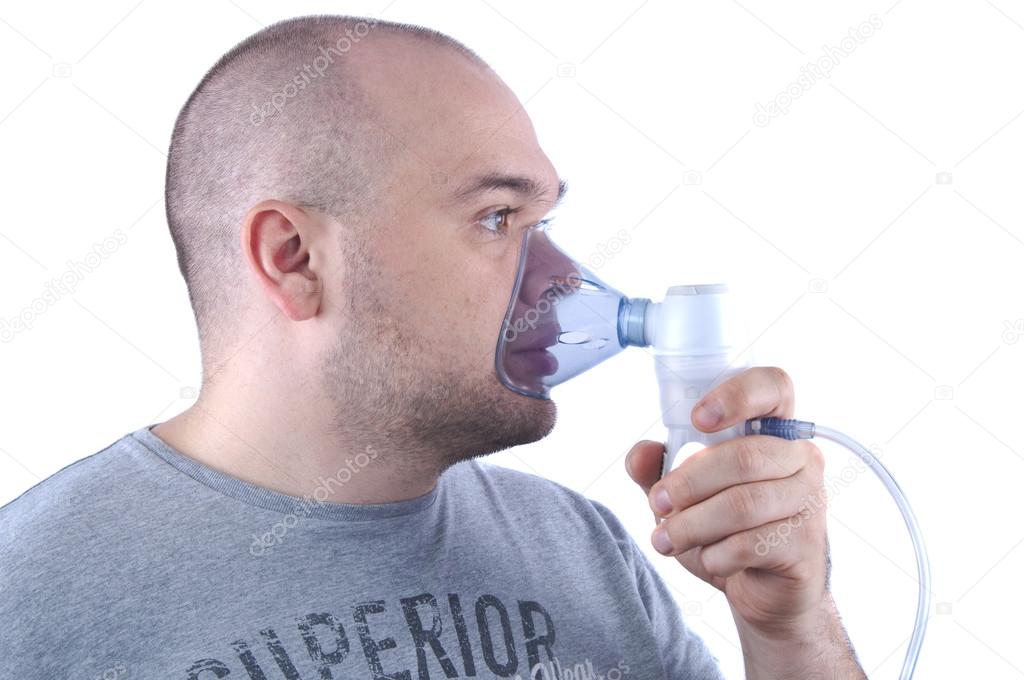 young man with an inhaler